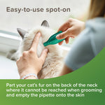 Applying Beaphar VETOpure spot-on to the skin on the back of a cat's neck
